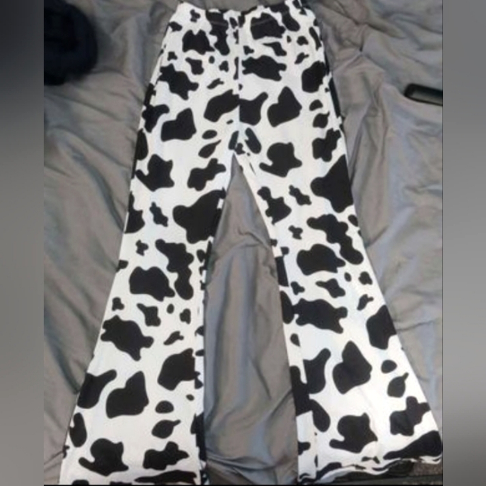 Cow print bellbottom leggings